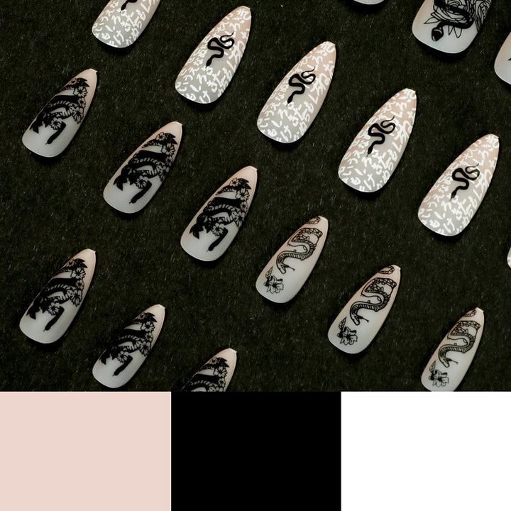 Artful nail extensions in elegant stiletto style with artistic floral and graphic designs Stornfield