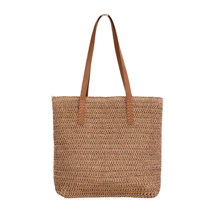 Spacious wicker tote bag with sturdy leather handles Stornfield