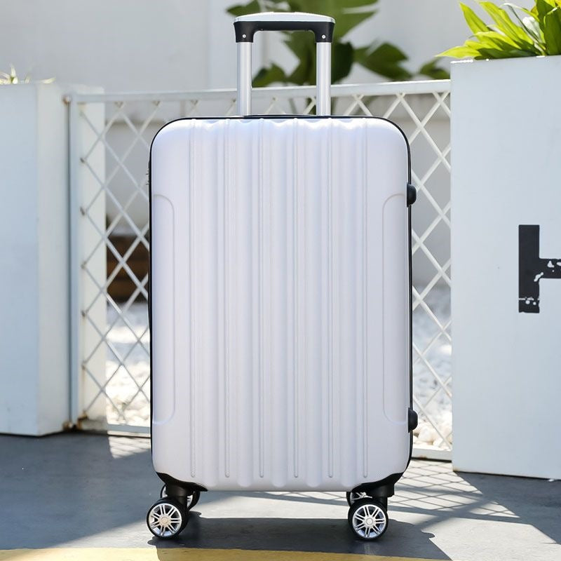 Hard shell suitcase with 360-degree wheel system and integrated safety feature Stornfield