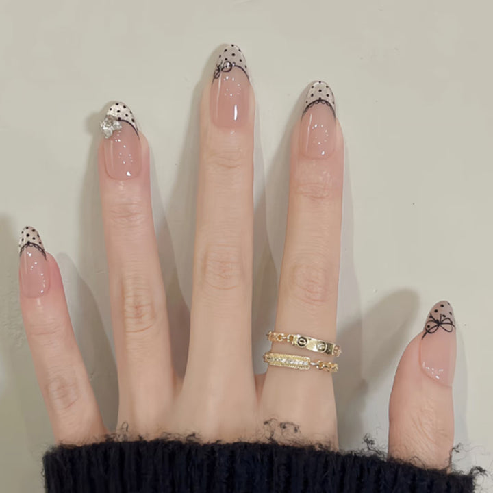 Elegant artificial nails with glitter and French design Stornfield