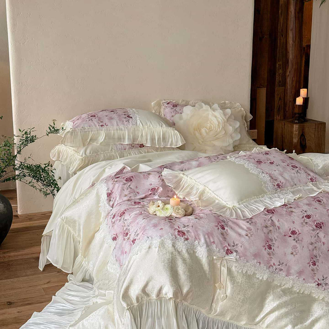 Romantic bedding and bedspread set with ruffles, lace trim, and floral quilting