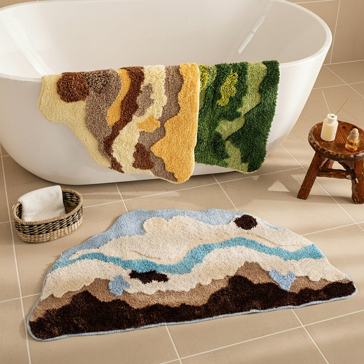 Shaped hand-tufted living room rug with moss-like structure and relief optics Stornfield
