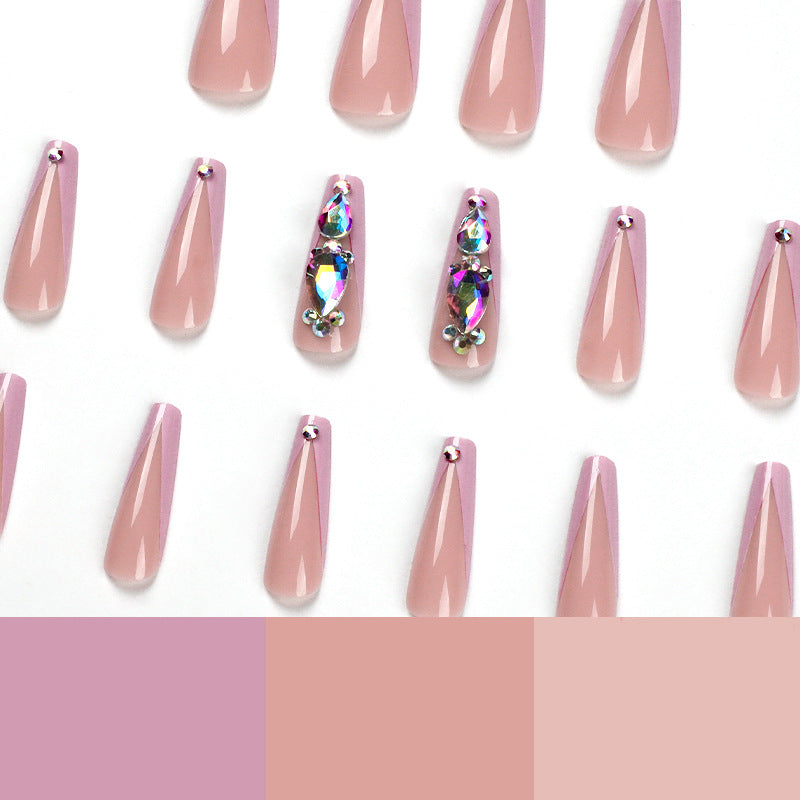 Artful nail extensions with rhinestone and flower accents Stornfield