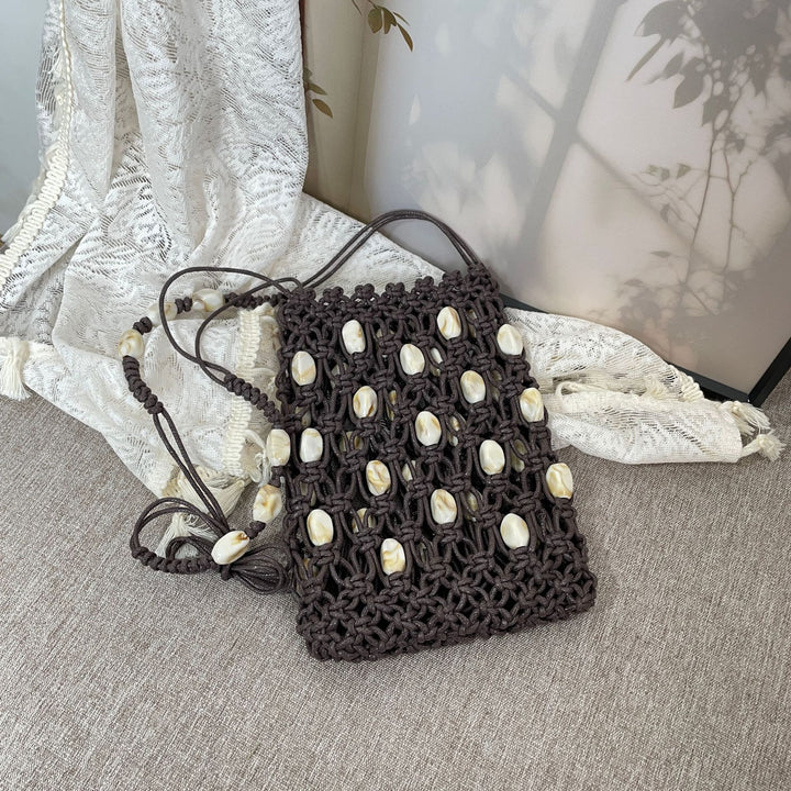 Hand-knotted shoulder bag with shells Stornfield