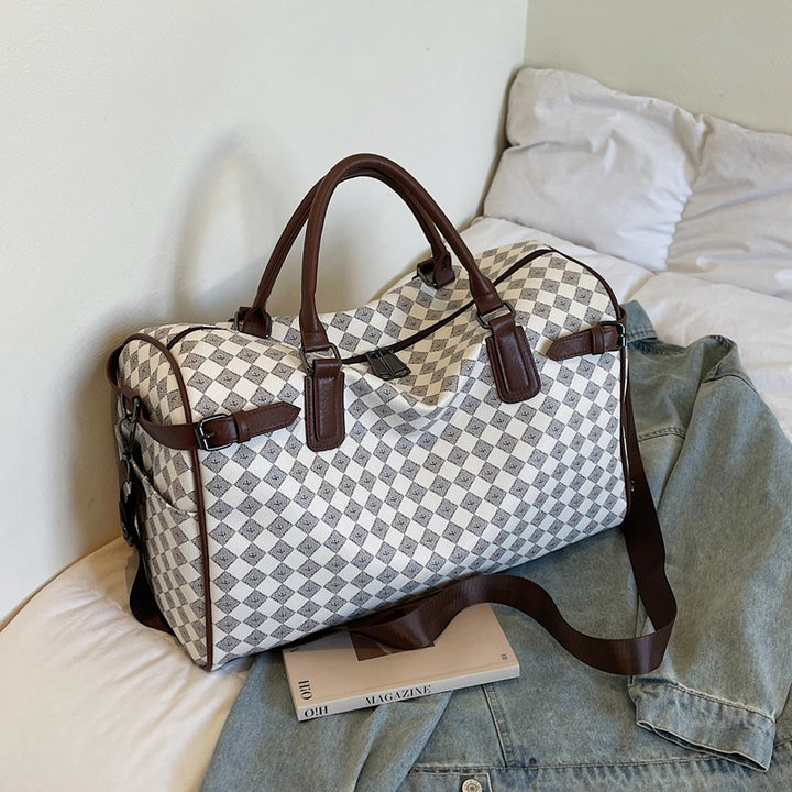 Sporty travel bag with multiple compartments and reinforced carrying handles Stornfield