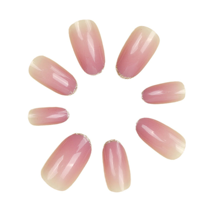 Elegant Stiletto Nail Extensions with Glittering French Tips Stornfield