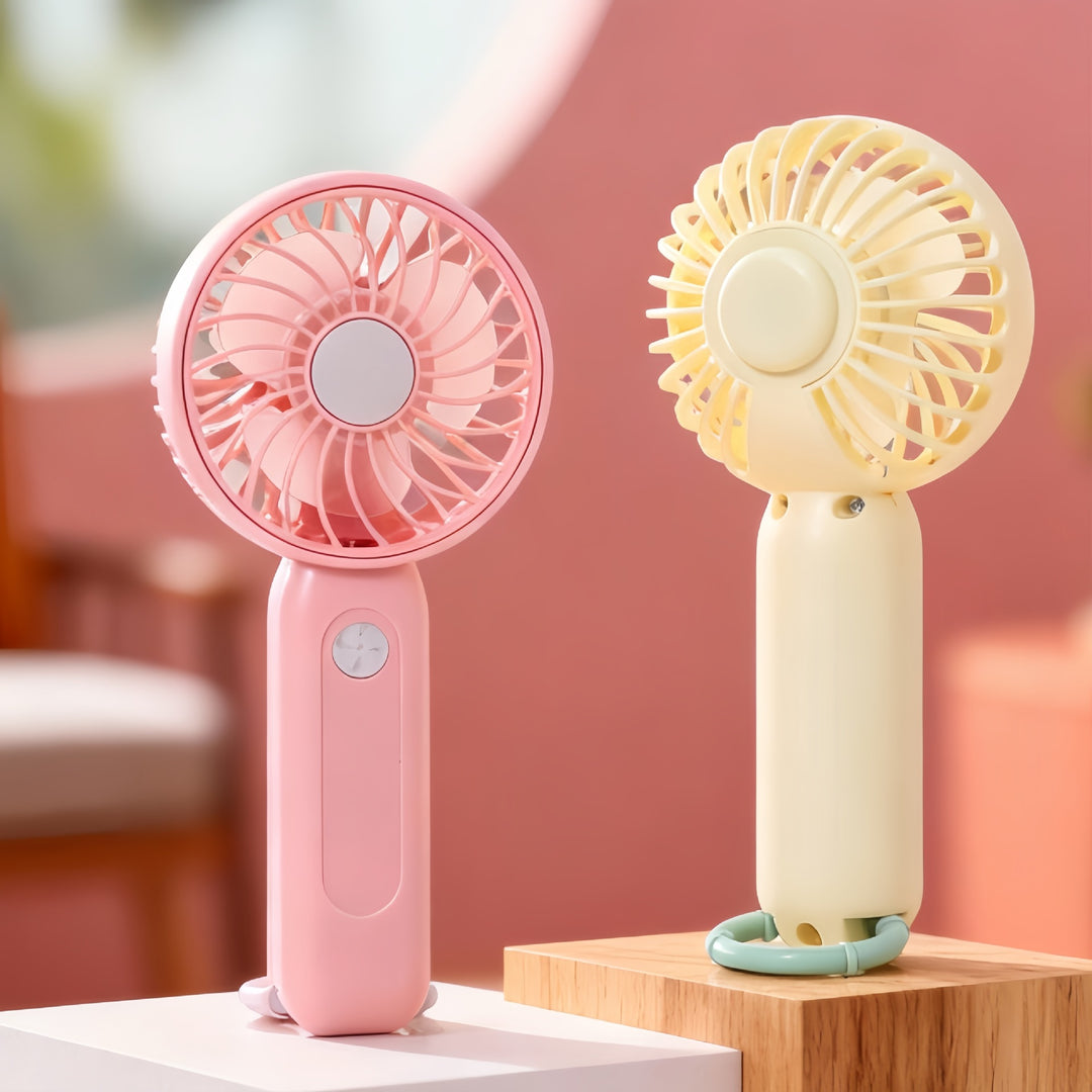 Women's portable battery-operated hand fan with ergonomic design and USB charging Stornfield