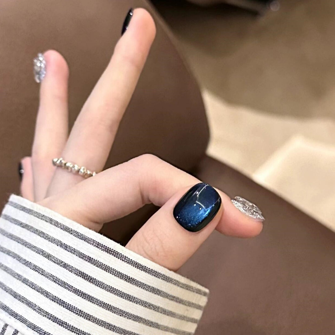 Creative artificial nails with shimmering effects Stornfield
