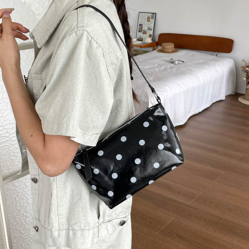 Sleek Polka Dot Handheld Clutch