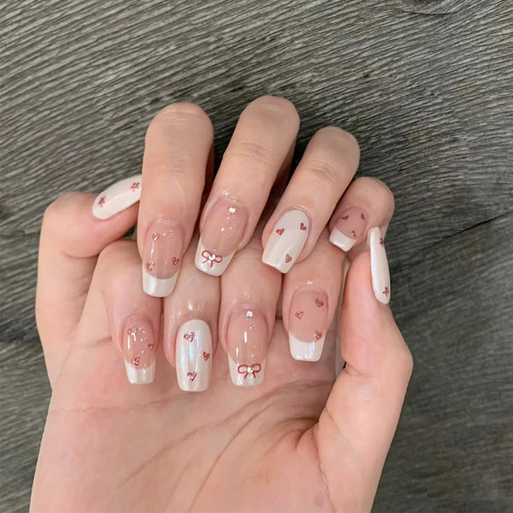 Decorative Press-On Nail Set with Heart and Bow Designs Stornfield