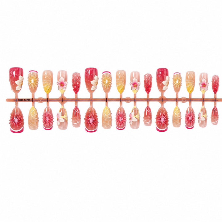Artificial nail set with elegant floral details and glitter effects Stornfield