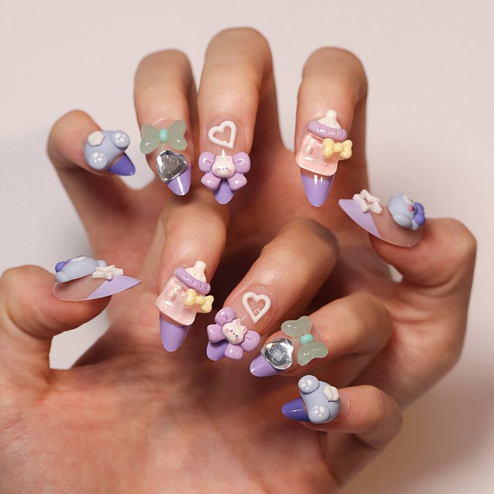 Artificial nail art with playful designs Stornfield