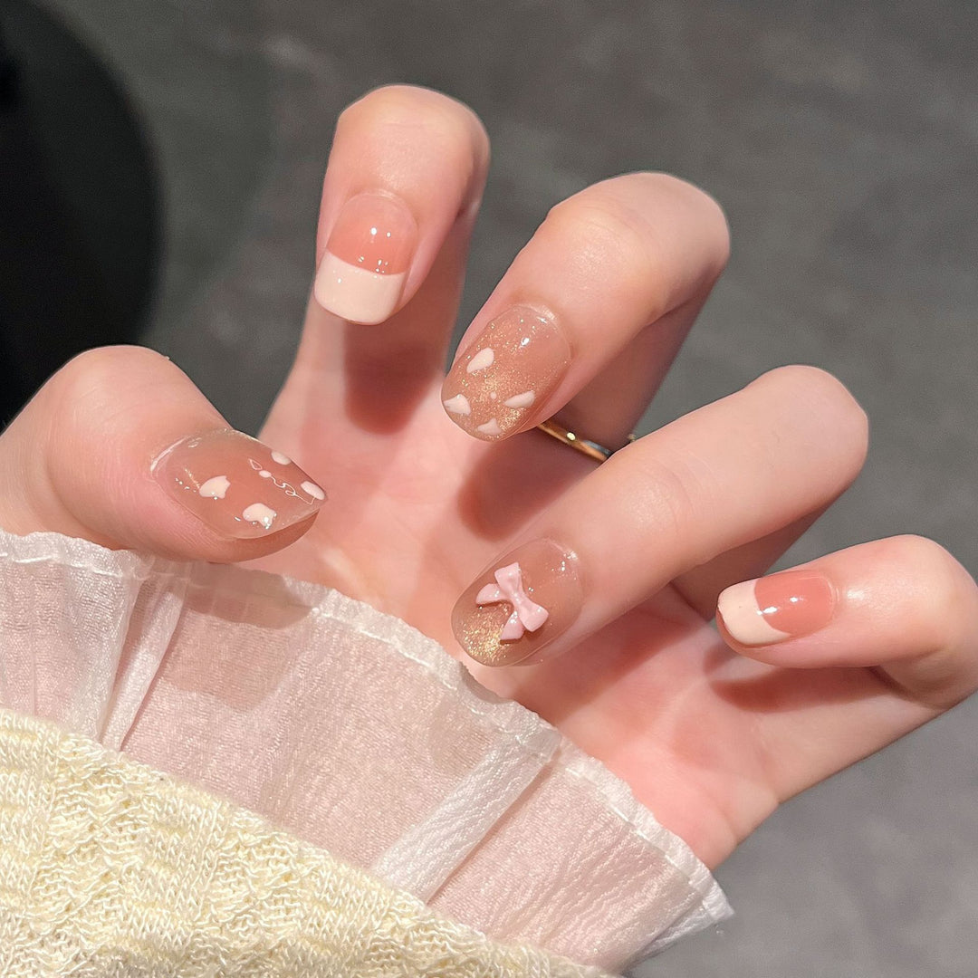 Elegant Nail Art Extensions with Pearl Accents Stornfield