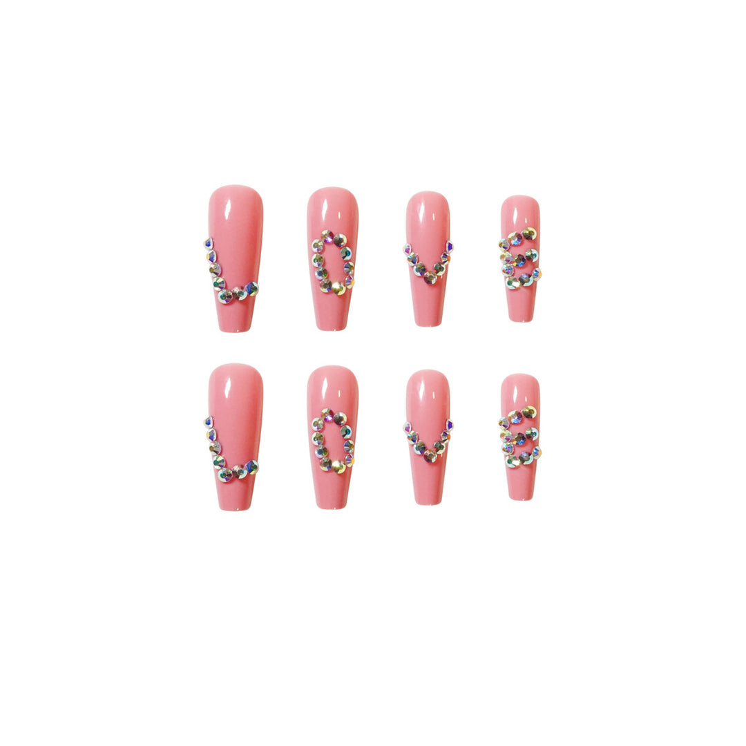 Artificial nail extensions with elegant rhinestone embellishments Stornfield