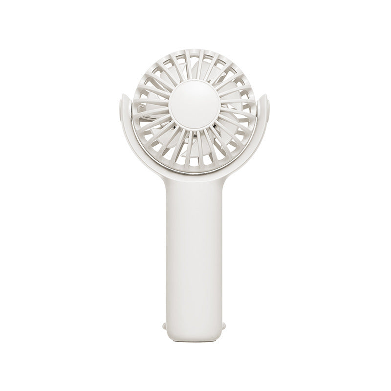 Women portable handheld fan with ergonomic grip and USB charging Stornfield