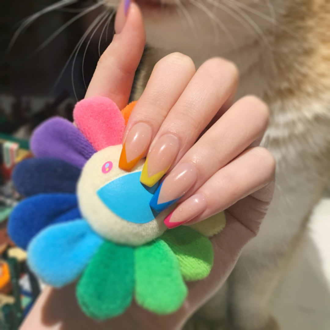 Artificial nail art with colorful tips and elegantly accented designs Stornfield