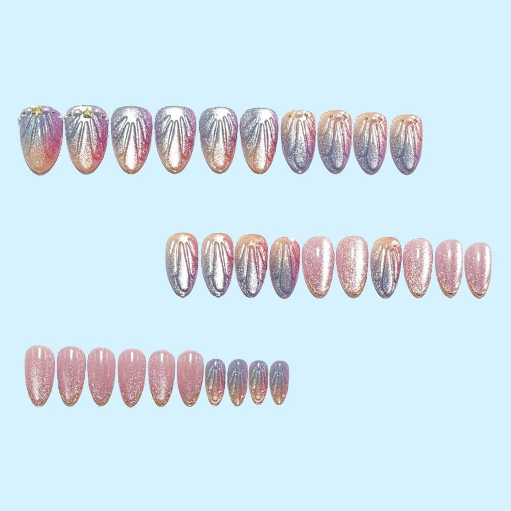 Artificial nails in elegant ombre design with glitter embellishments Stornfield