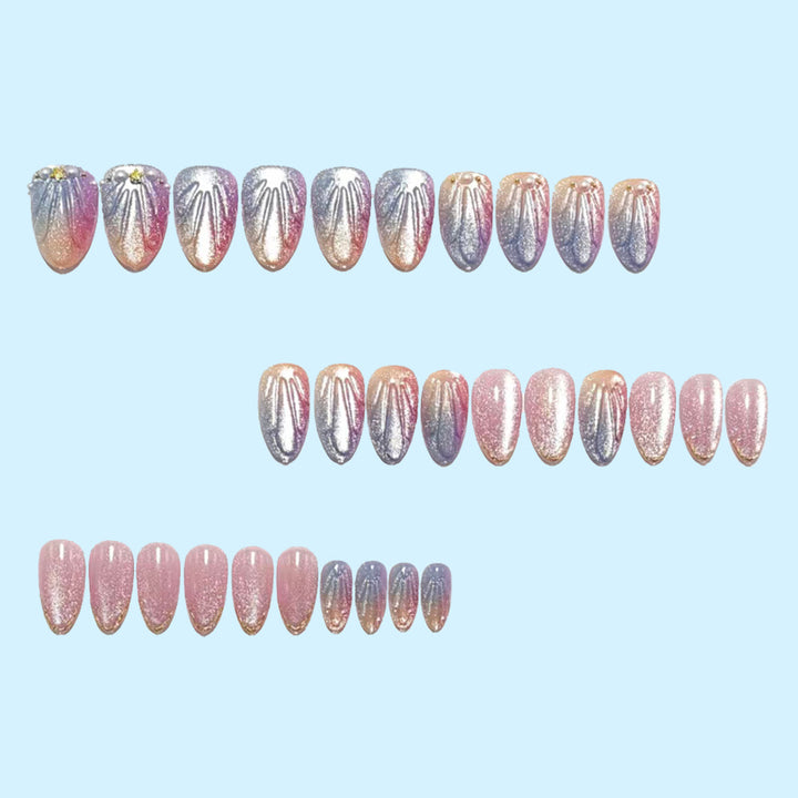 Artificial nails in elegant ombre design with glitter embellishments Stornfield