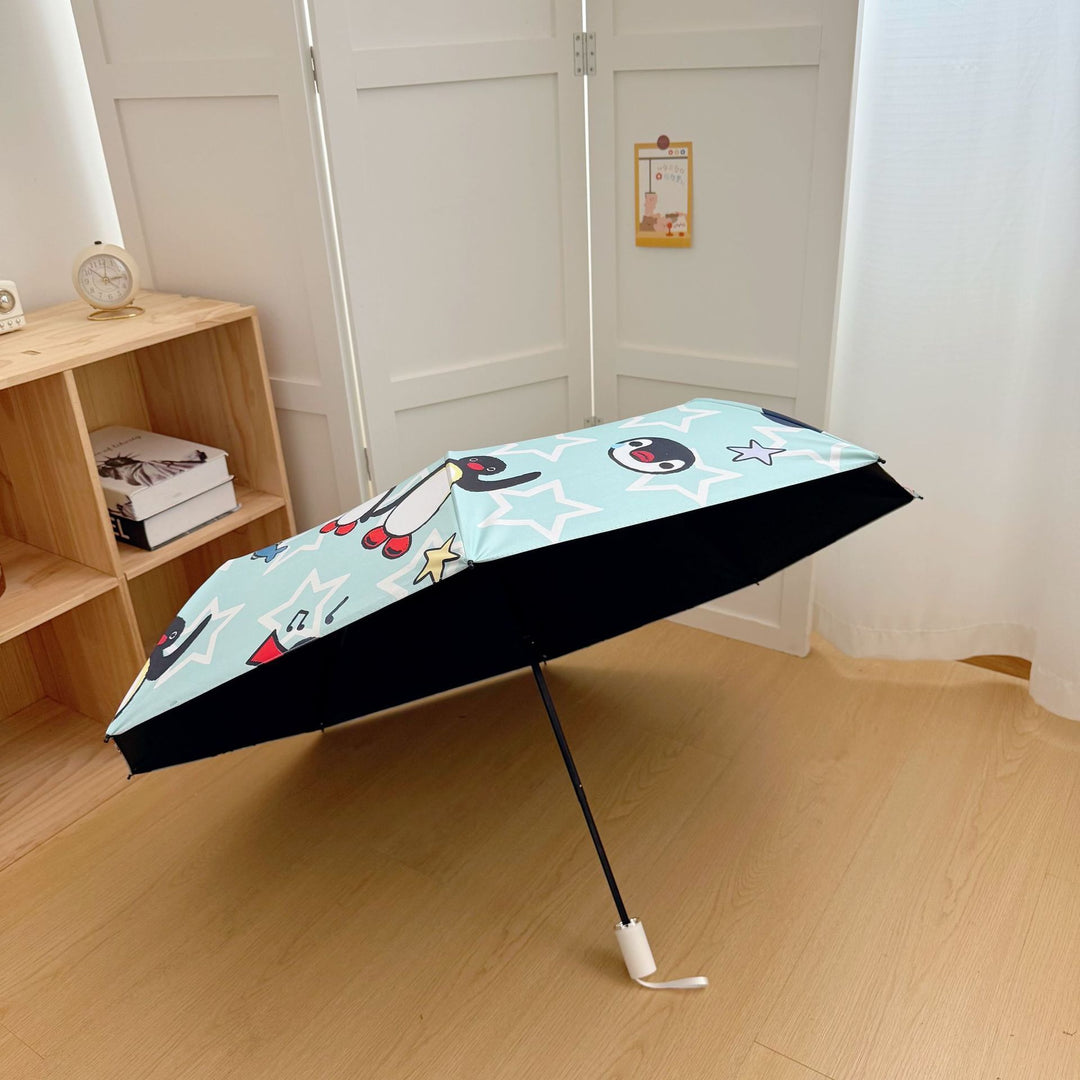 Ladies collapsible umbrella with playful penguin design Stornfield