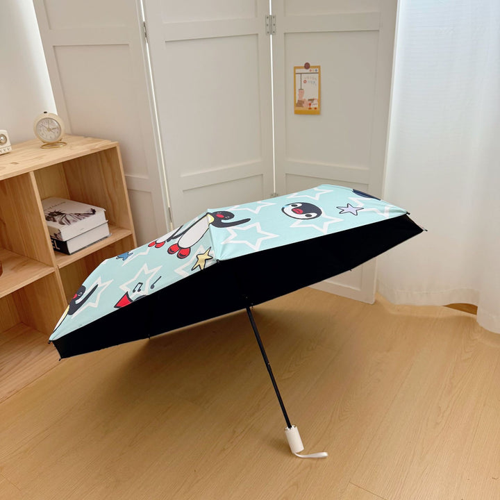 Ladies collapsible umbrella with playful penguin design Stornfield