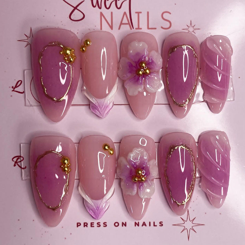 Artificial nail set with elegant flower accents Stornfield