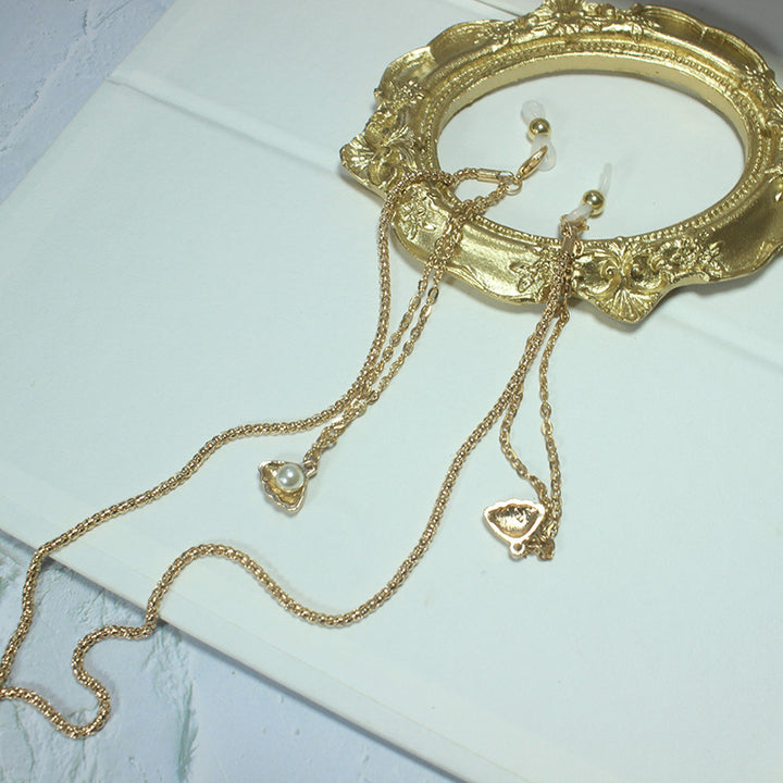 Elegant necklace with green stone and golden accents Stornfield
