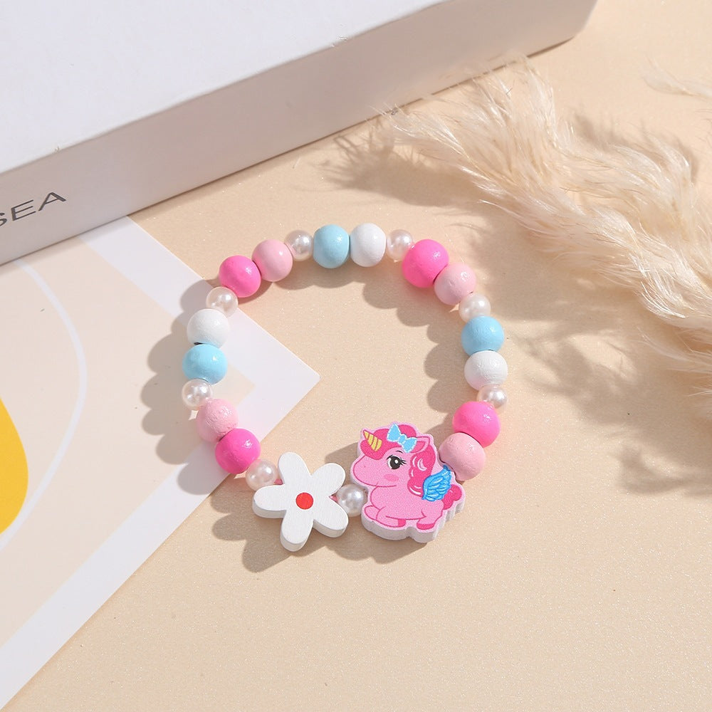 Playful children's bracelet with unicorn and flower motif Stornfield