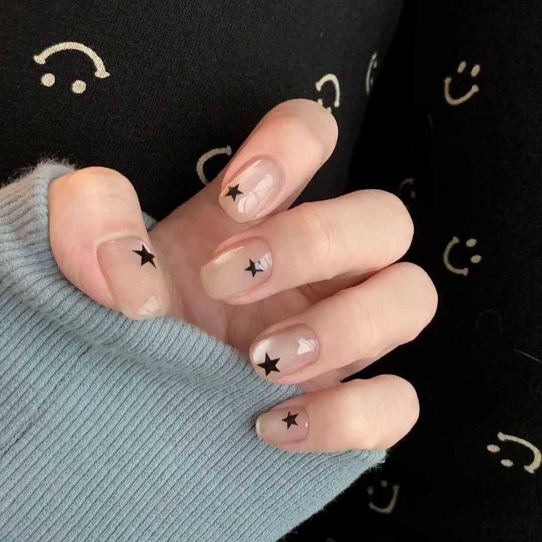 Artistic Press-On Nail Set with Star Designs Stornfield