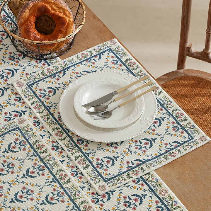 Decorative woven table runner with floral embroidery