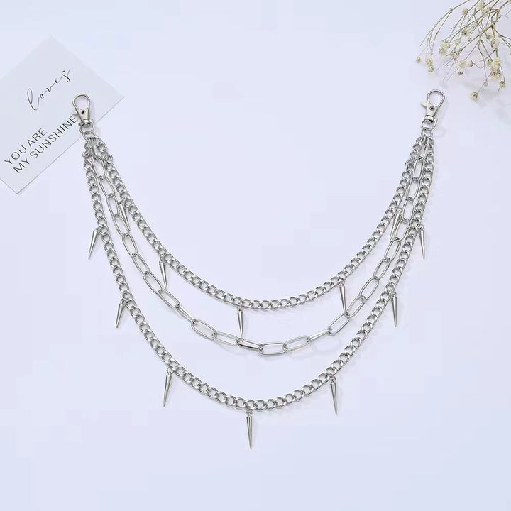 Fashionable chain belt with spiked details Stornfield