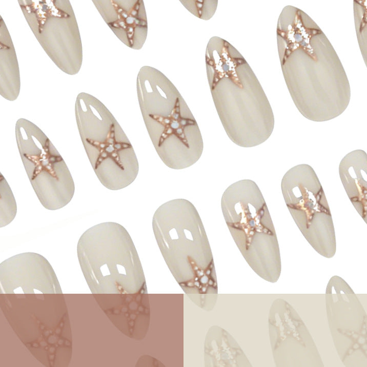 Elegant Starfish-Embellished Nail Art Stornfield