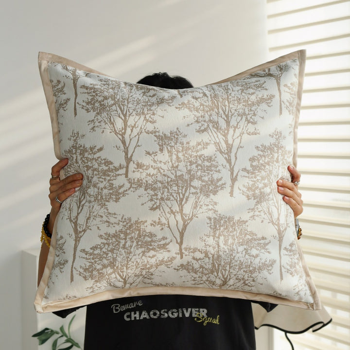 Decorative pillow with botanical tree design
