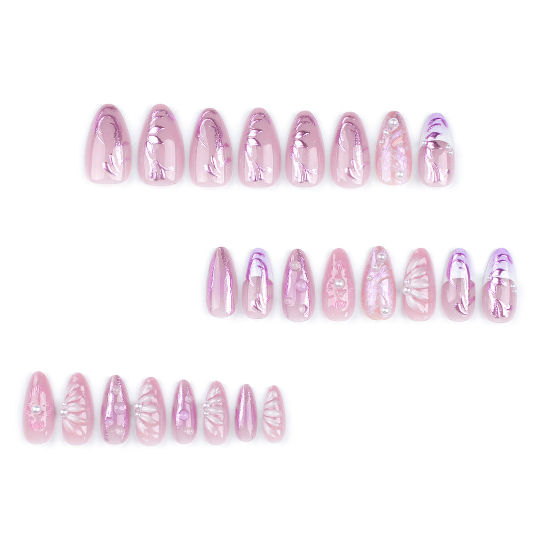 Artificial nail extensions with delicate floral designs and glitter accents Stornfield