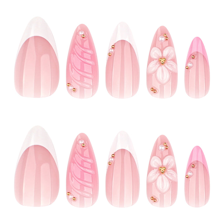Artificial nail art with floral design and glitter accents Stornfield