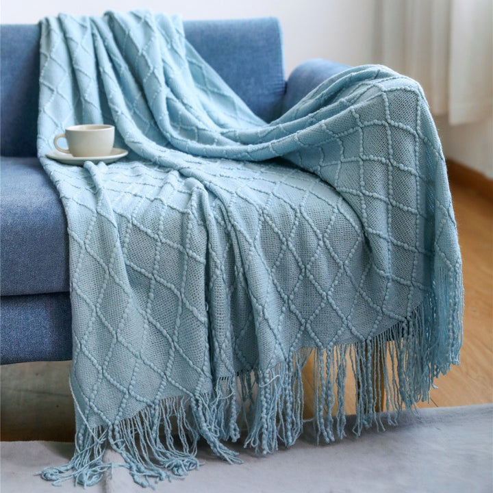 Women’s knitted blanket with textured wave pattern Stornfield