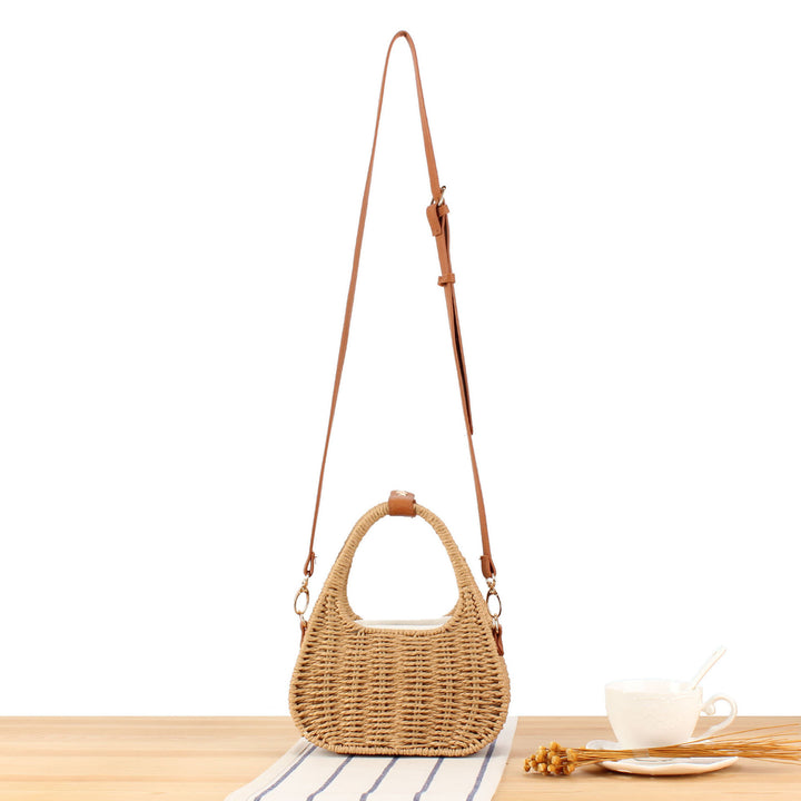 Shoulder bag made of woven natural material with elegant leather accent Stornfield