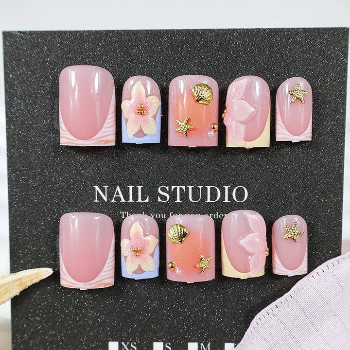 Nail art set with floral accents and elegant shine Stornfield