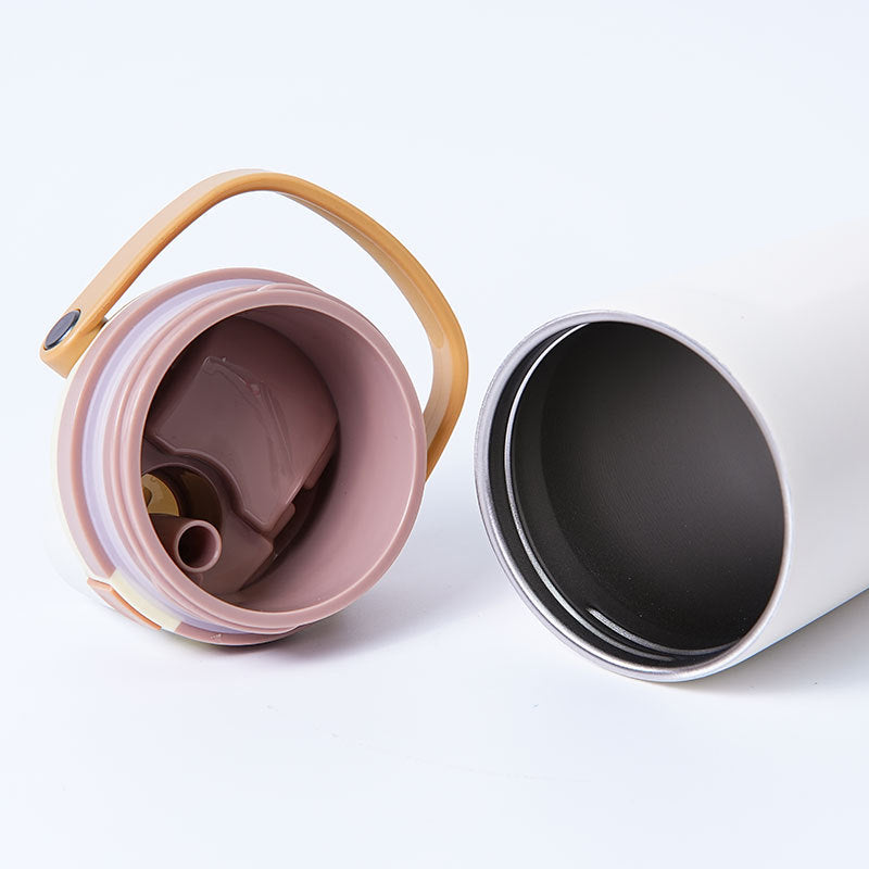 Unisex double-walled vacuum drinking bottle made of stainless steel with one-handed click closure and carrying handle Stornfield