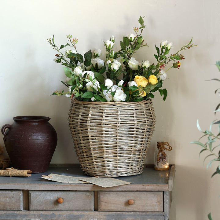 Stylish laundry basket made of braided natural material Stornfield