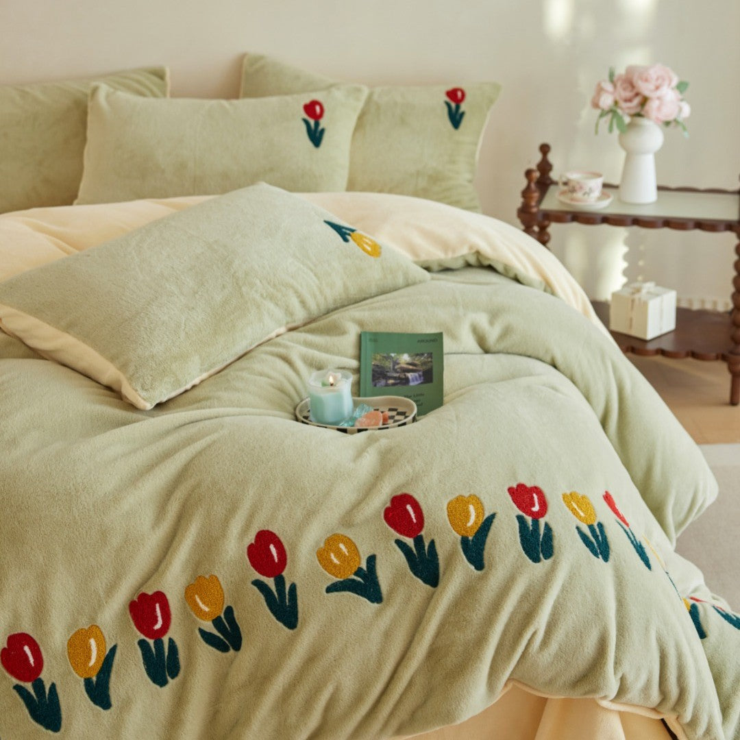 Plush duvet cover set with embroidered tulips, cozy teddy fleece, reversible function, and matching pillowcases