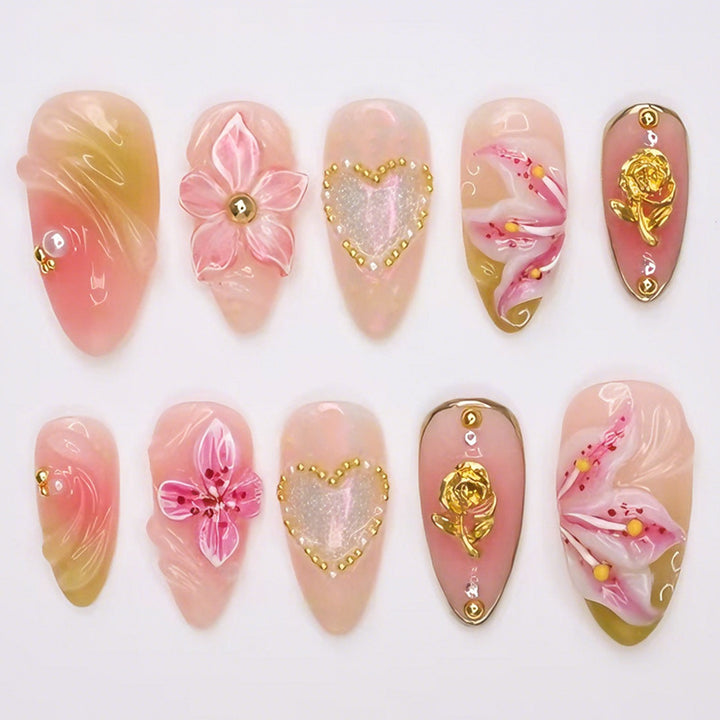 Artificial nail set with delicate flower designs and glamorous accents Stornfield