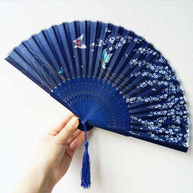 Women Elegant handcrafted fan with floral motifs Stornfield