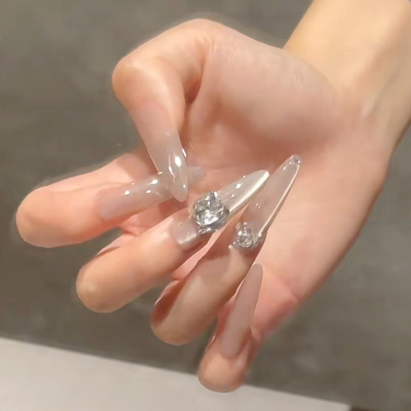Acrylic nail set with glitter design and elegant 3D applications Stornfield