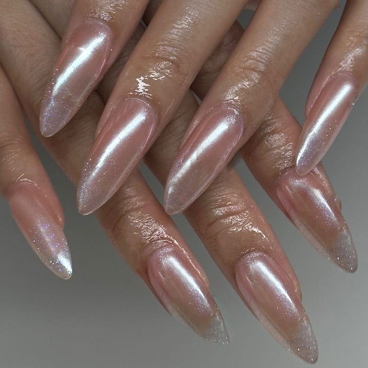 Artistic stiletto nails with glitter gradient and elegant design Stornfield