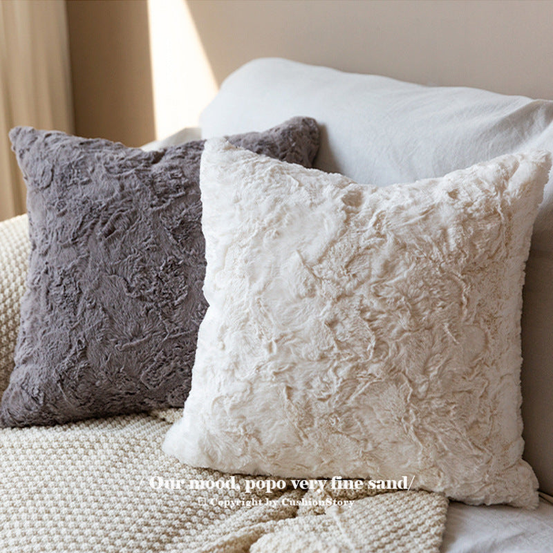 Cozy decorative cushion with textured surface