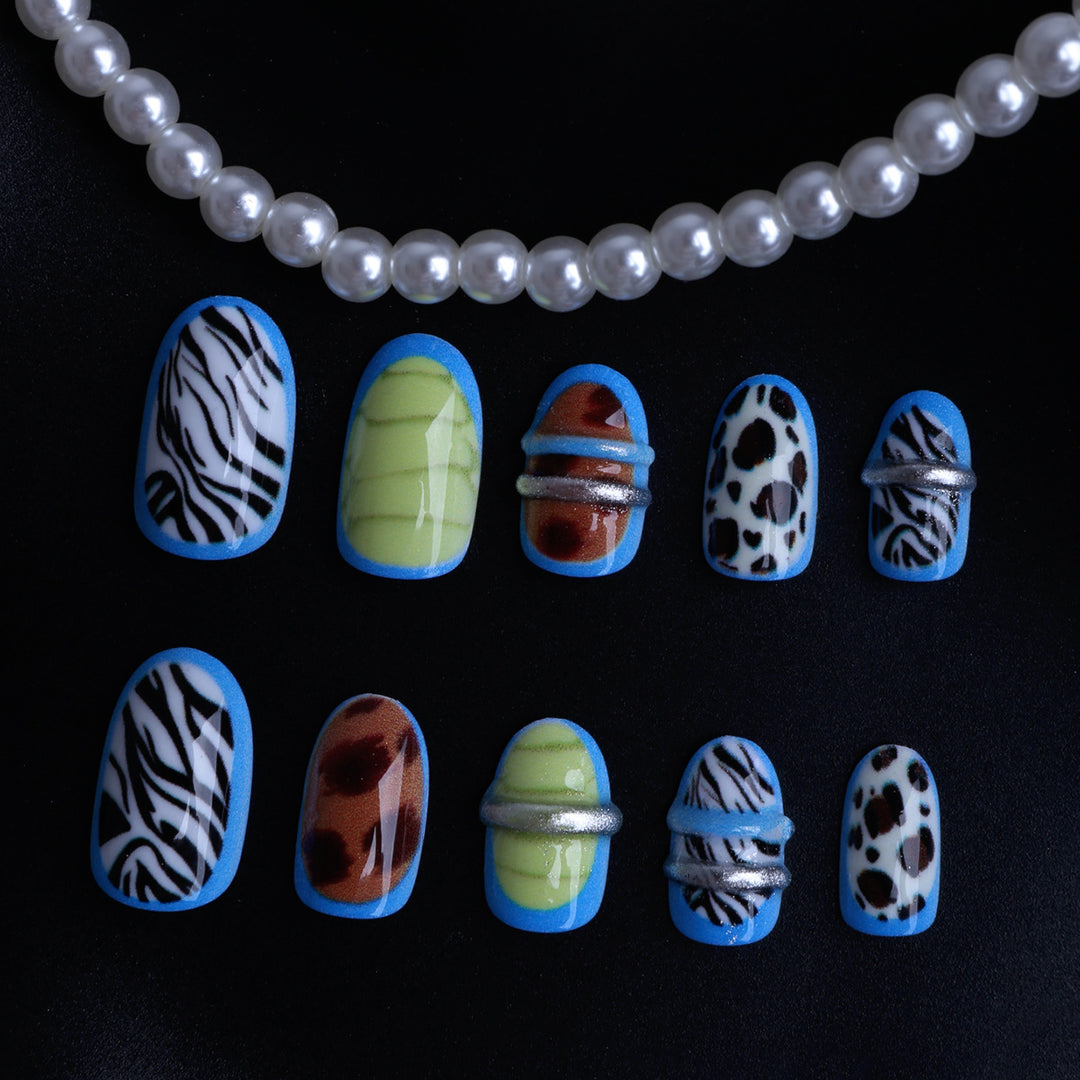 Creative art stick-on nails with modern animal motifs and colorful accents Stornfield