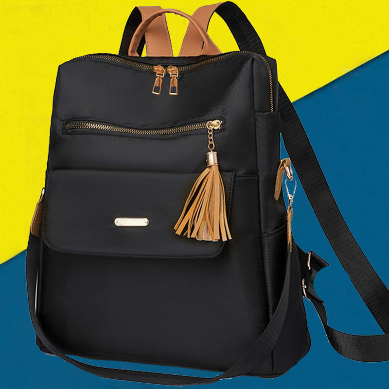 Multi-Functional Backpack with Decorative Tassel Stornfield