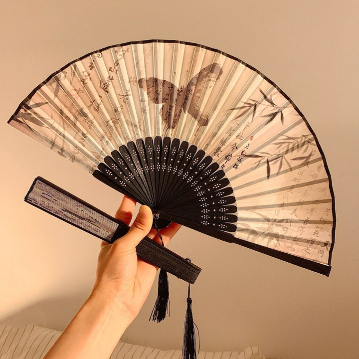 Handcrafted fan with elegant butterfly design Stornfield