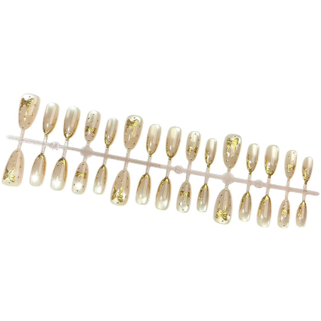 Elegant Press-On Nail Set with Gold Bow Accents