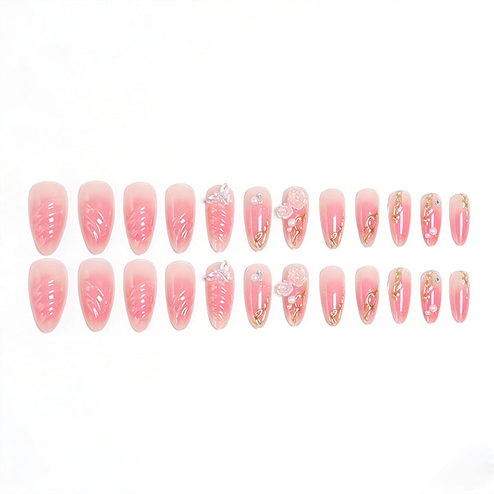 Artificial nail creation with floral 3D details and glitter accents Stornfield